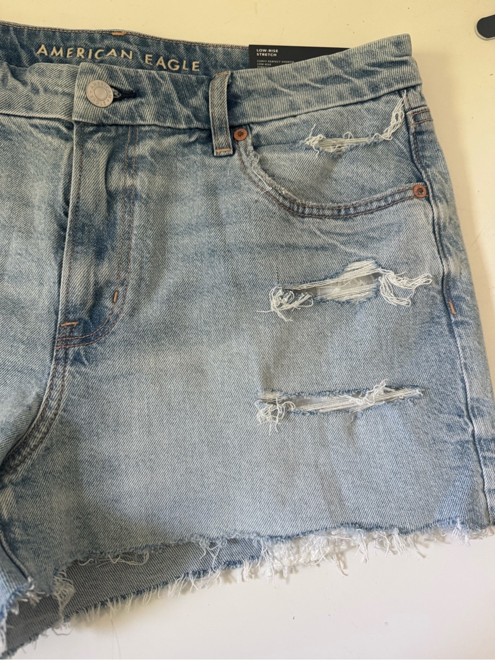 American Eagle Outfitters Light Wash Distressed Denim Cutoff Shorts - Picture 5 of 14